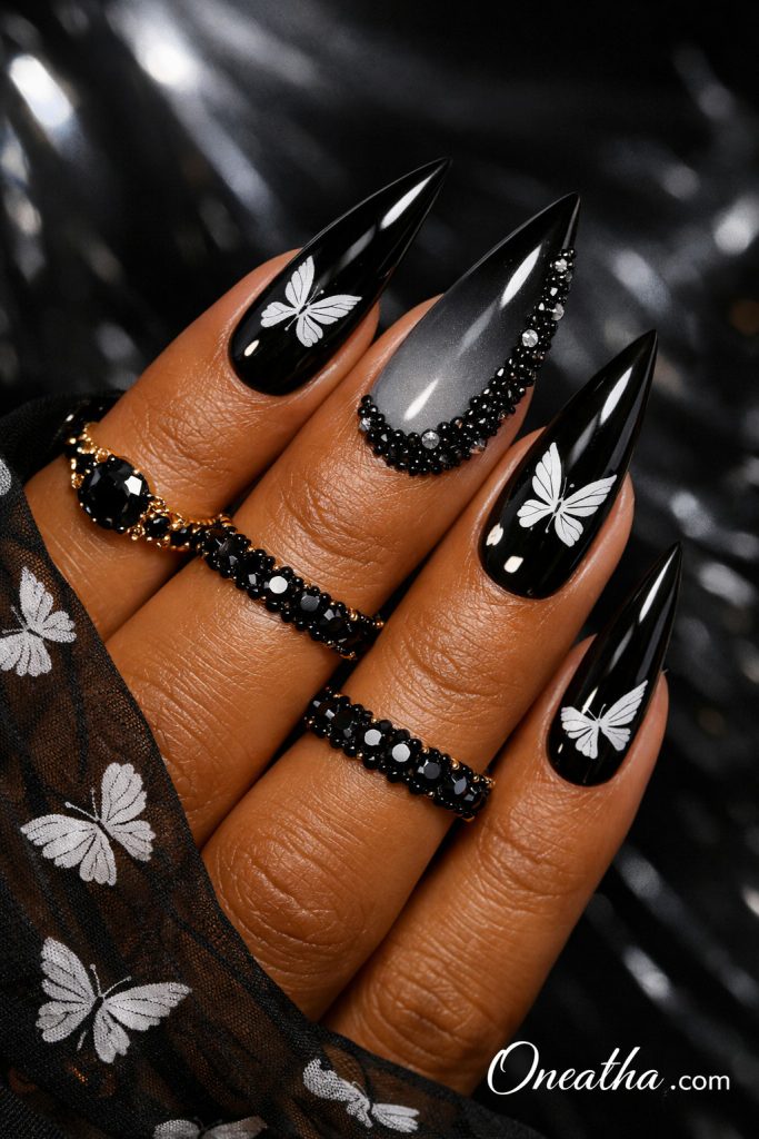 White butterfly nails with glossy finish, soft feminine nail design featuring delicate butterfly art, elegant manicure with butterflies, luxury butterfly nail inspiration, almond and stiletto butterfly nails design.