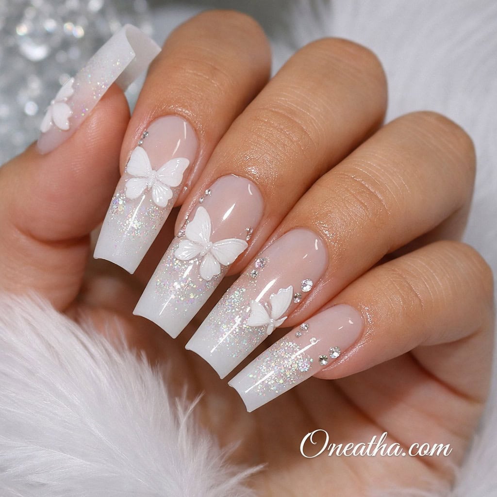 White butterfly nails with glossy finish, soft feminine nail design featuring delicate butterfly art, elegant manicure with butterflies, luxury butterfly nail inspiration, almond and stiletto butterfly nails design.