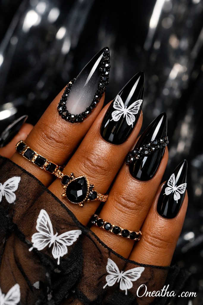 White butterfly nails with glossy finish, soft feminine nail design featuring delicate butterfly art, elegant manicure with butterflies, luxury butterfly nail inspiration, almond and stiletto butterfly nails design.