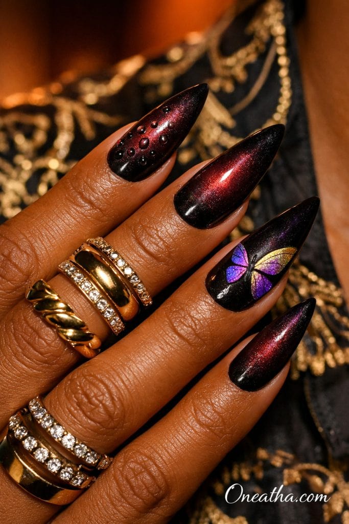 dark purple butterfly nails with black chrome cat eye effect, burgundy shimmer nails with butterfly accent, luxury stiletto nails with glossy finish and 3D water droplet design, purple butterfly nail art inspiration