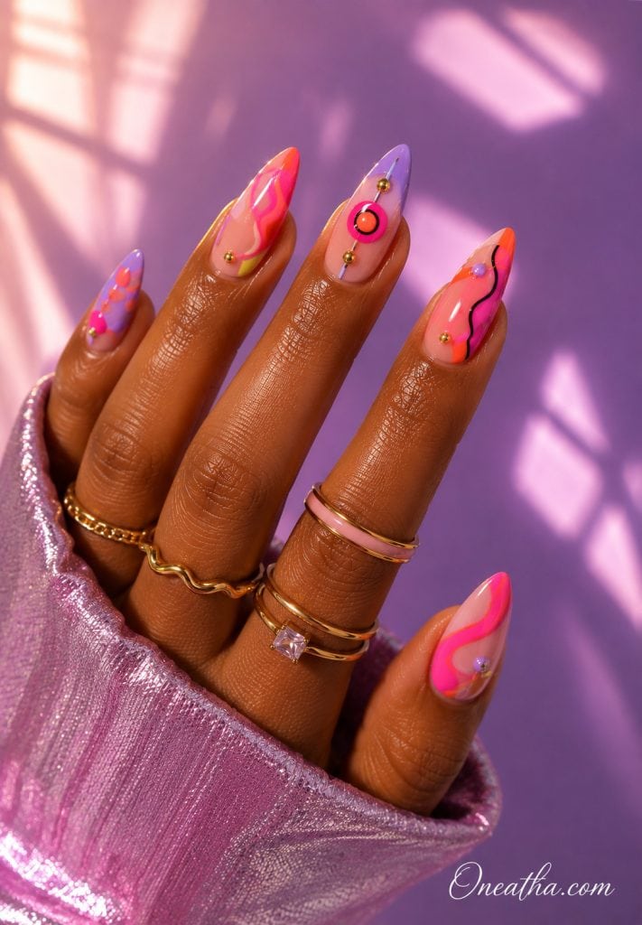 Editorial pop nails with vibrant abstract details by Oneatha.