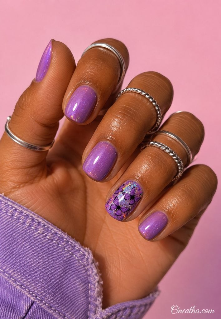 Glossy lilac butterfly accent nails.