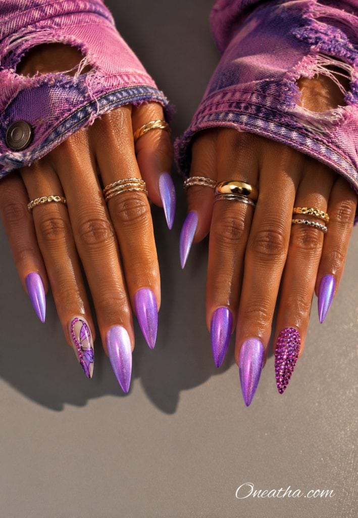 Purple shimmer butterfly stiletto nails.