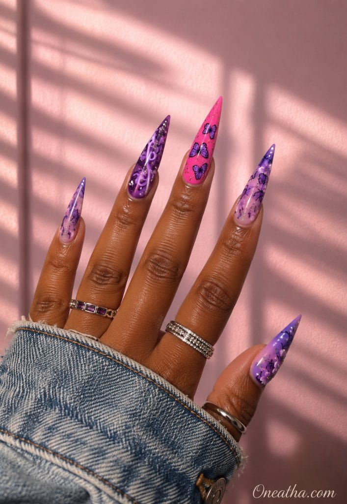 Pink and purple butterfly floral stiletto nails.
