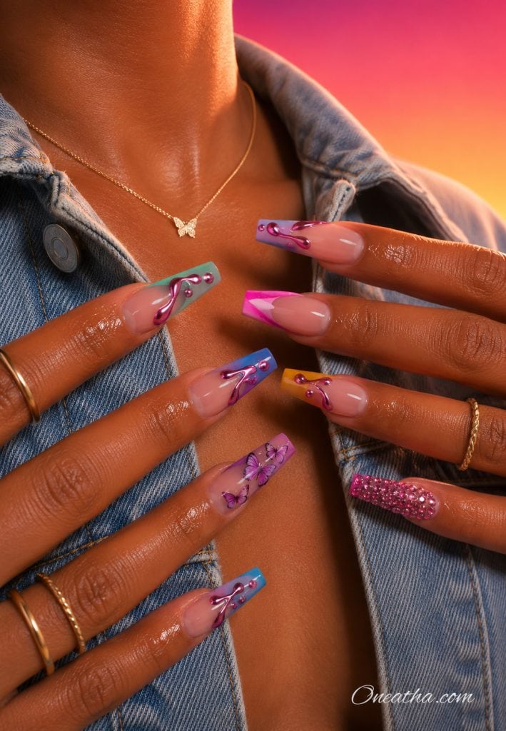 Colorful candy French tip nails with butterfly accents.