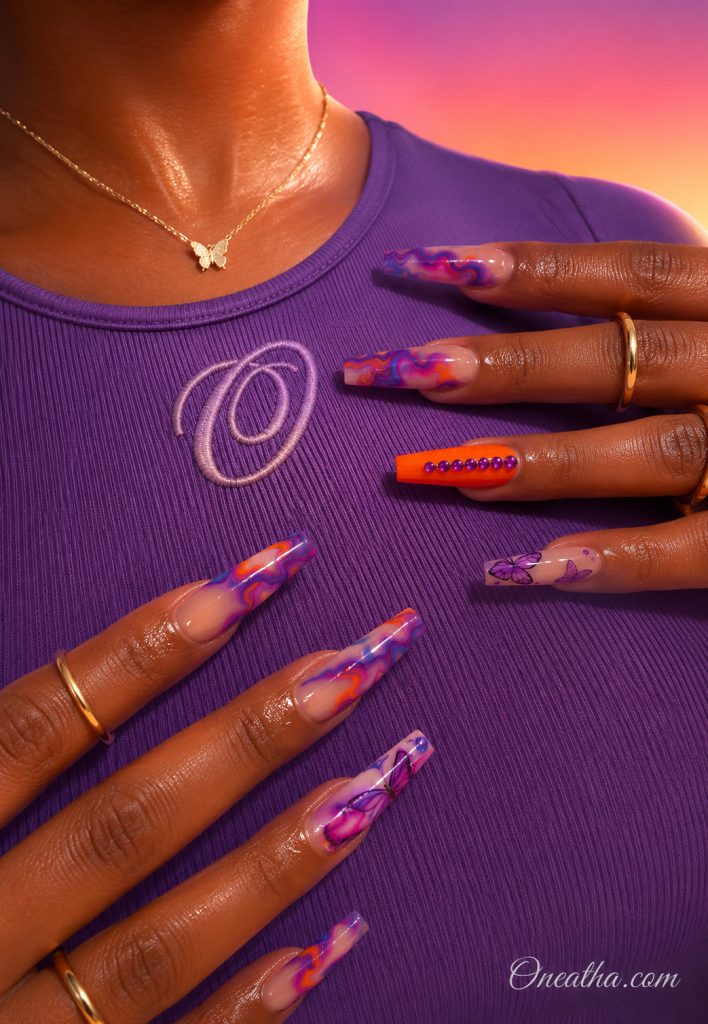 Purple swirl nails with butterfly accents and orange details.