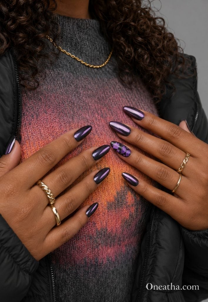 Glossy blackberry chrome nails with a purple butterfly accent.