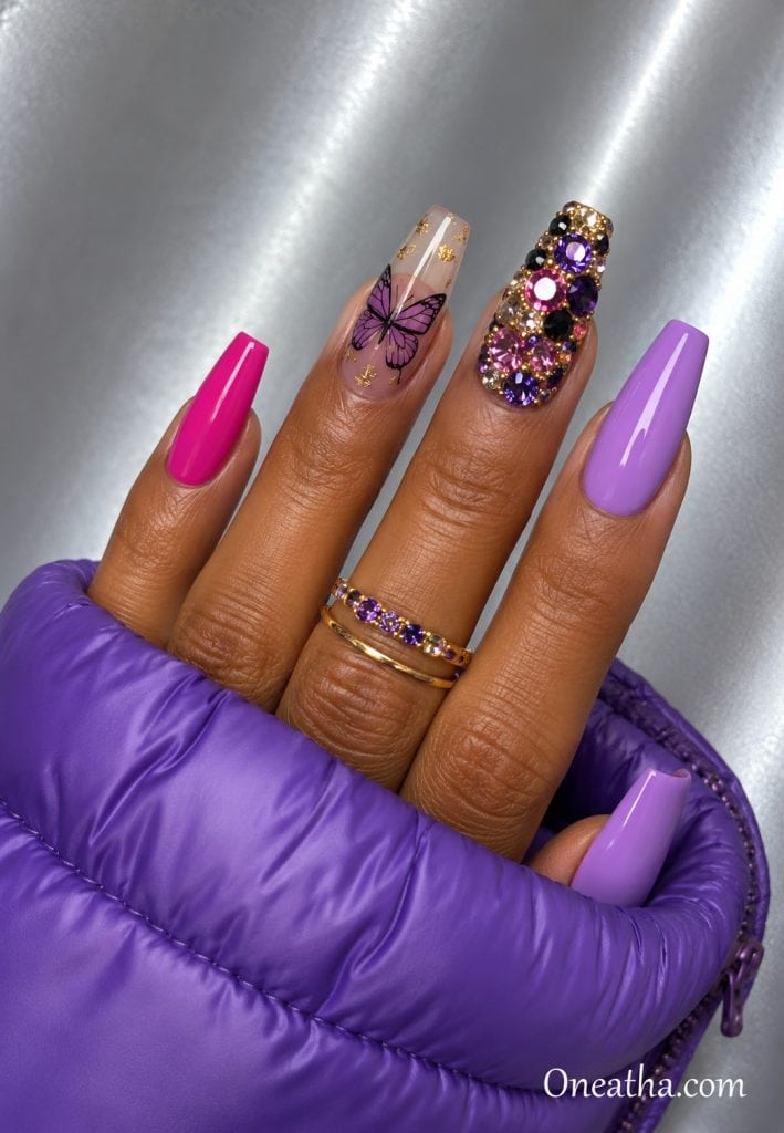 Gemstone luxe nails with hot pink and lavender accents.