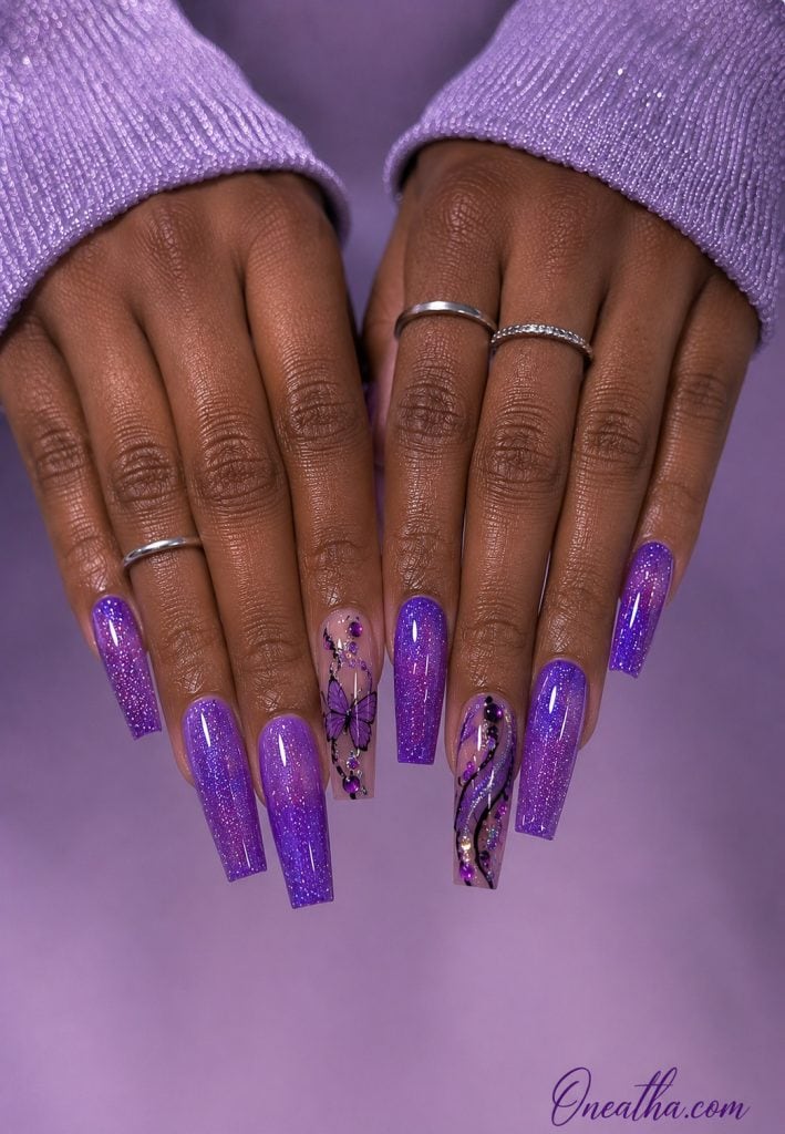 Purple butterfly glitter nails with swirl accents.