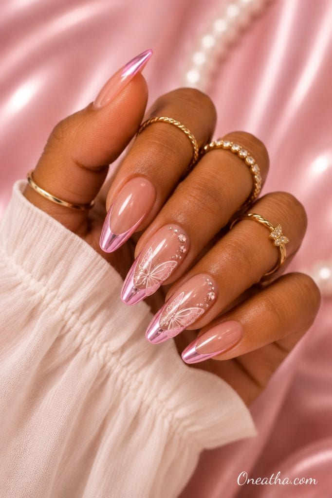 Pink chrome French butterfly nails.