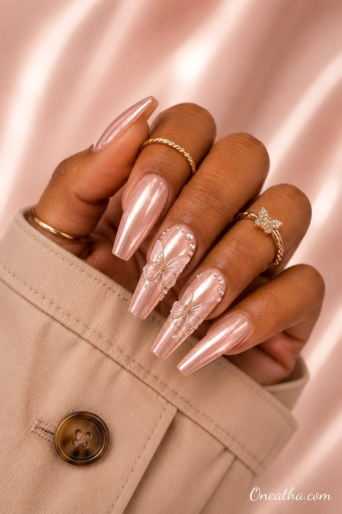 Pearl butterfly chrome nails.