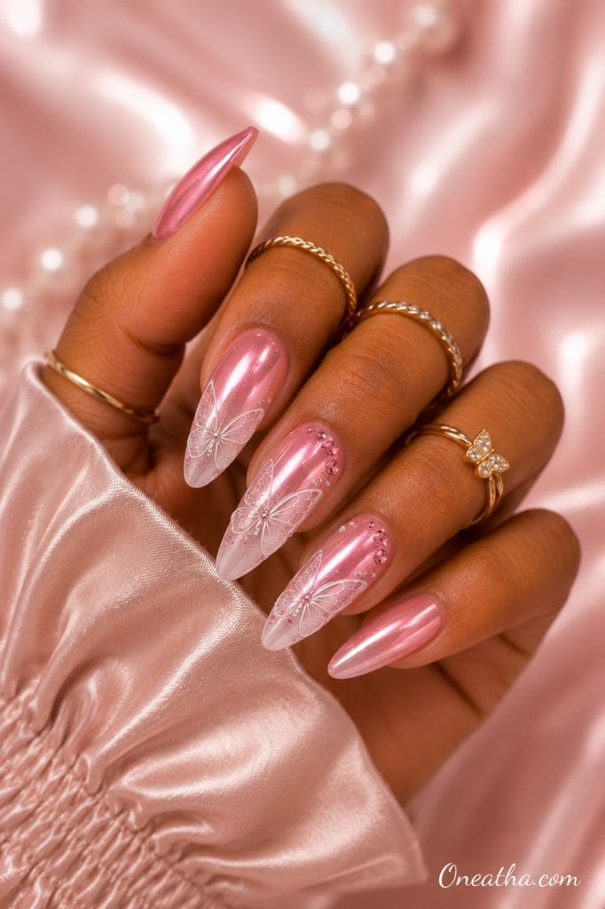 Pink ombre butterfly nails.