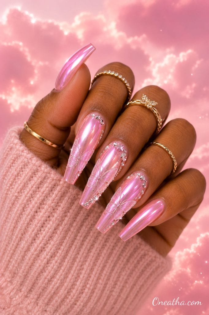 Pink aura butterfly nails.