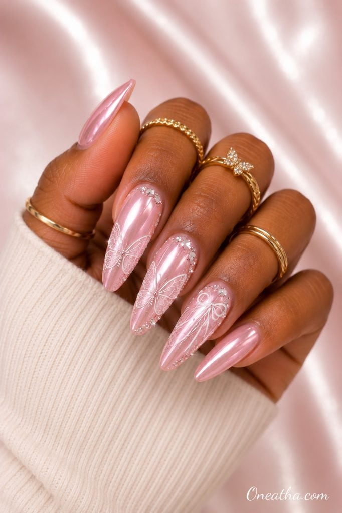 Ballet pink butterfly nails.