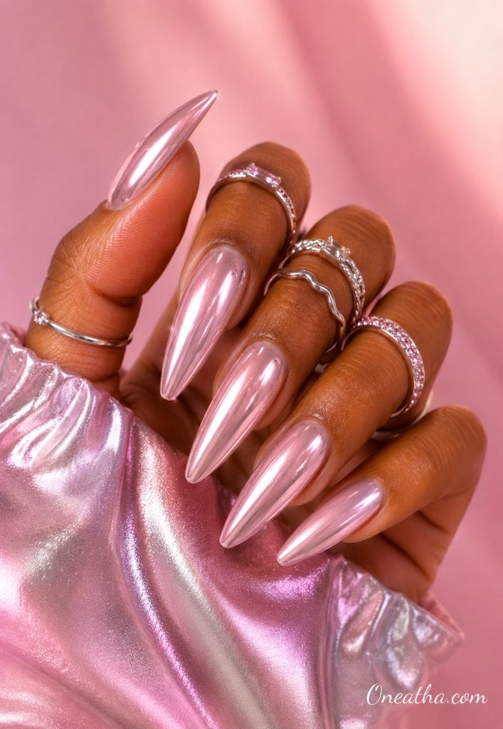 Icy pink chrome nails.