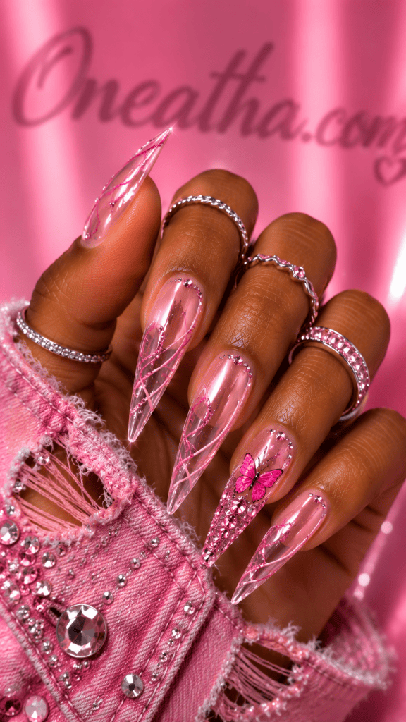Rhinestone butterfly chrome nails.