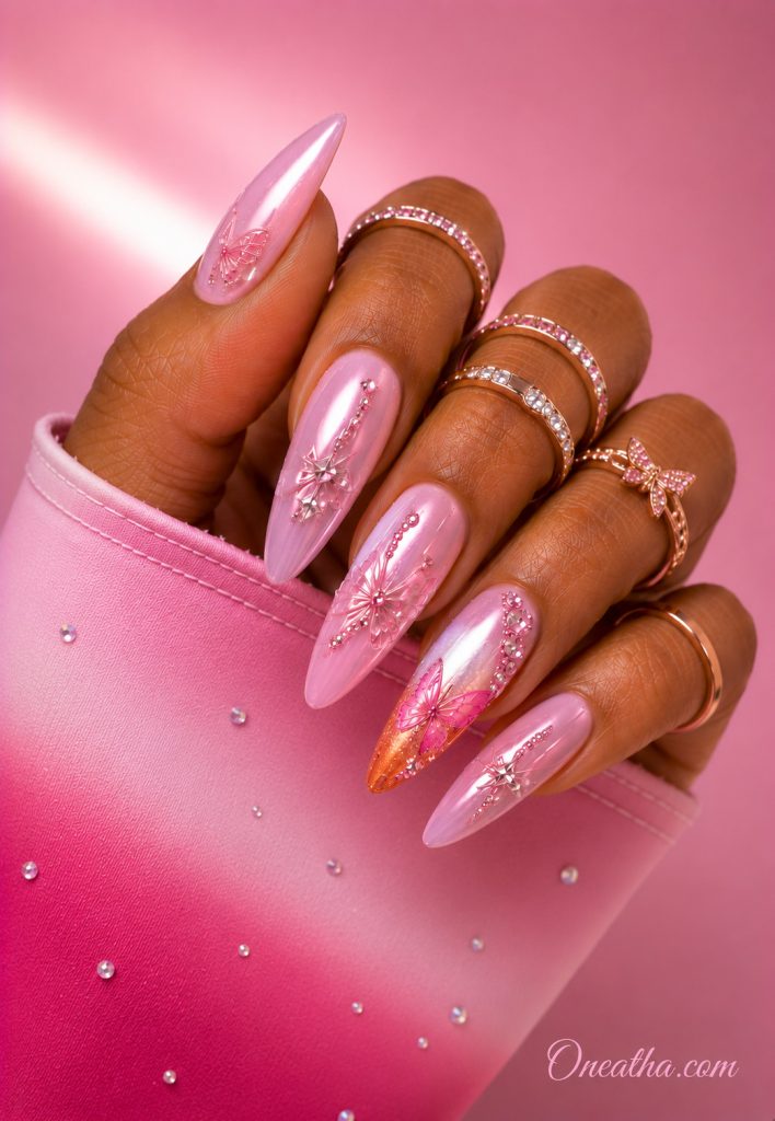 Soft pink crystal butterfly nails.