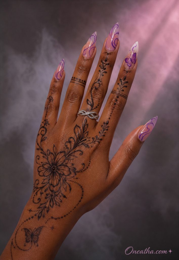 Purple swirl butterfly nails with elegant black henna art.