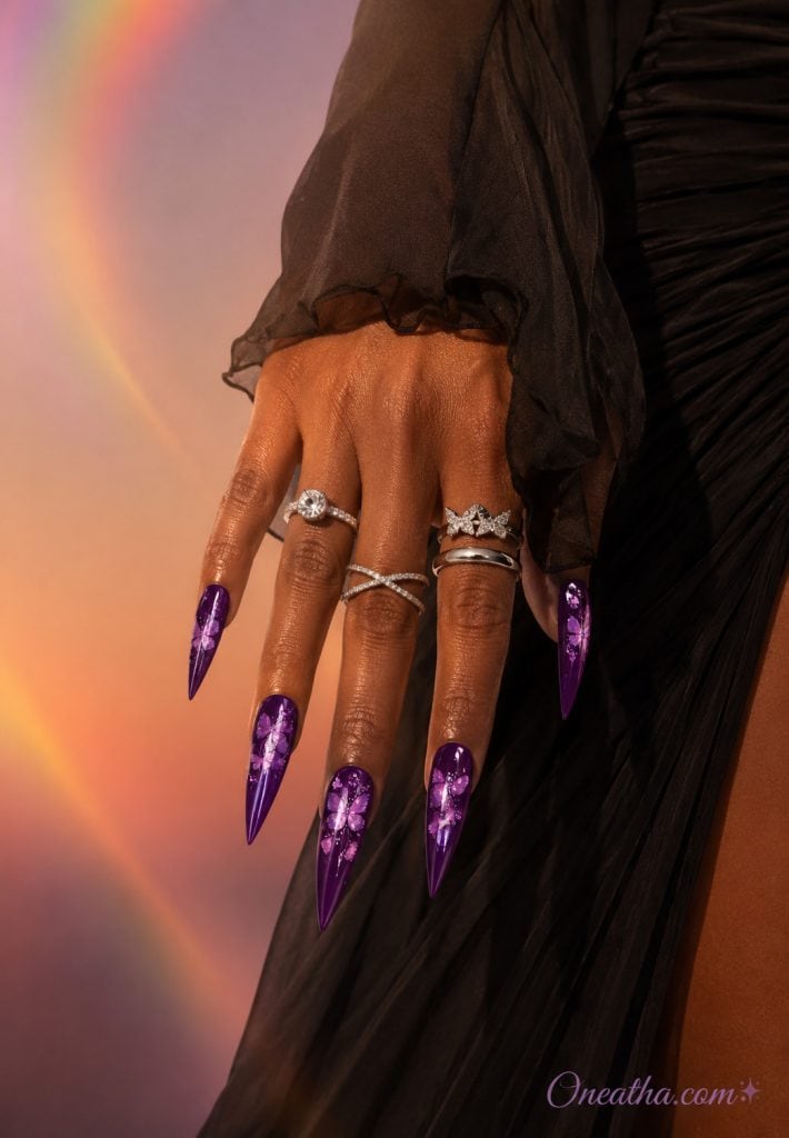 Purple chrome butterfly nails by Oneatha.