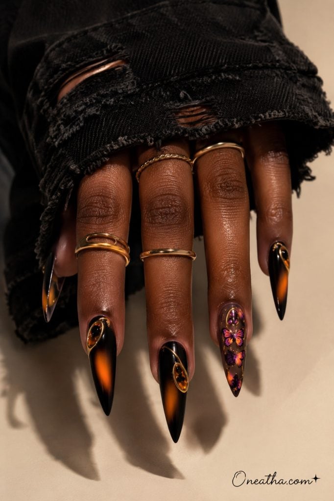 Black aura stiletto nails with a purple butterfly accent nail.