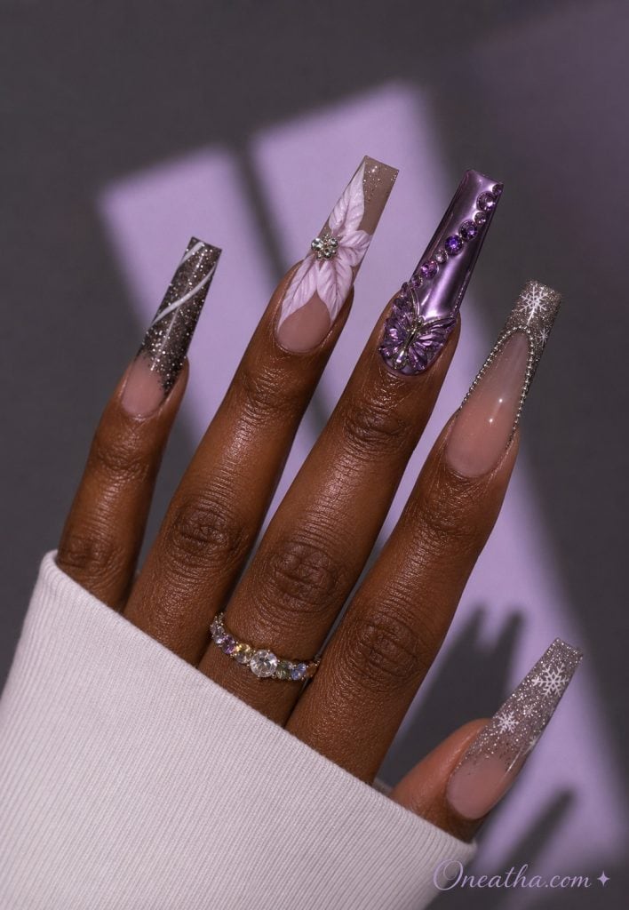 Purple chrome butterfly nails with snowflake glitter tips.
