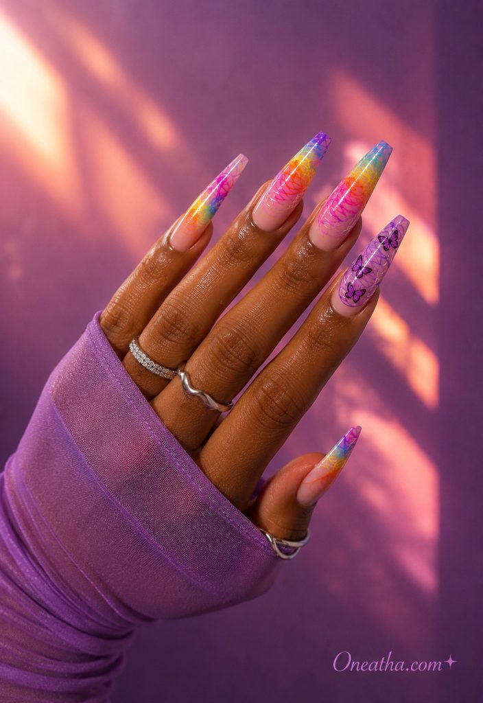 Neon scribble nails with a purple butterfly accent nail.