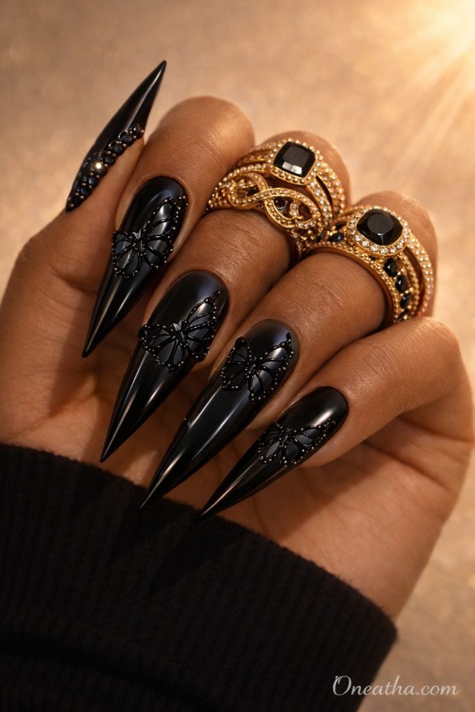 black butterfly nails with high shine gel finish and sleek design