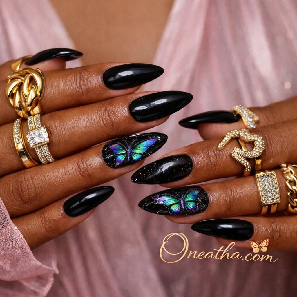Black butterfly nails with glossy black polish and iridescent butterfly designs featuring green, blue, and purple tones. Elegant black butterfly nail design with a galaxy-inspired sparkle effect and high-shine luxury finish.