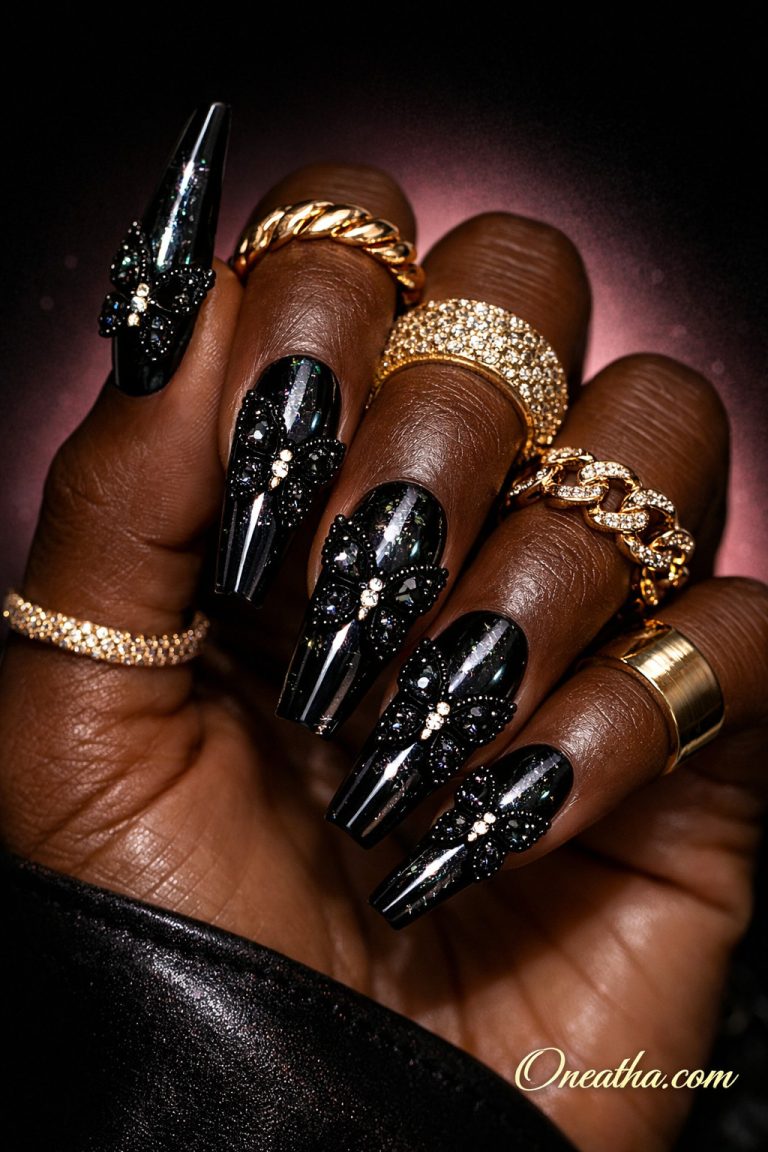 25+ Black Butterfly Nails That Feel Elevated, Striking, and Powerful Elegant hand with butterfly nails and gold rings (1)