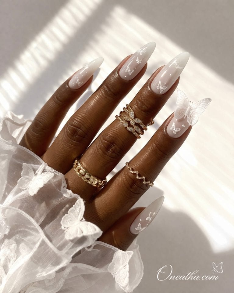 25+ White Butterfly Nail Designs Everyone Is Saving Right Now Elegant manicure with butterfly accents