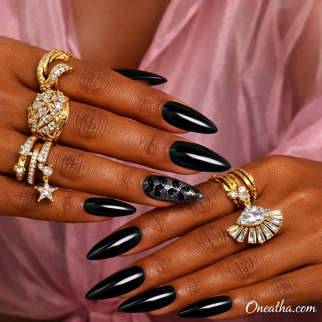 Black butterfly nails with glossy black finish and a subtle sparkle accent nail featuring butterfly design. Elegant black butterfly nail design with high shine, minimal detail, and a luxury polished look.