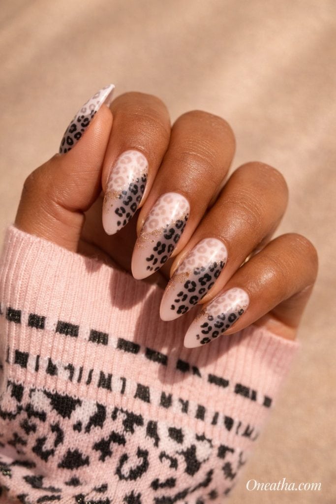 black and white leopard nails fashionable nail idea with bold luxury feel