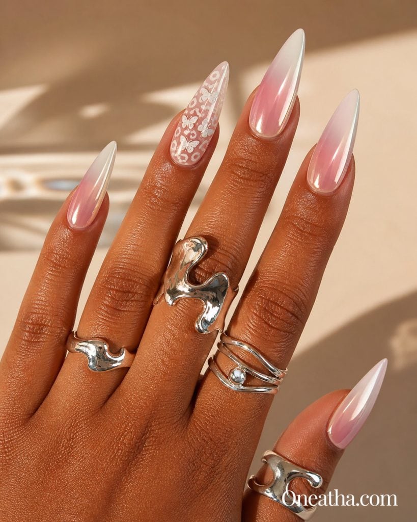 Summer butterfly nail designs by Oneatha featuring white chrome ombré nails with a chic glossy finish, soft elegant tones, and a clean modern butterfly-inspired summer nail look.