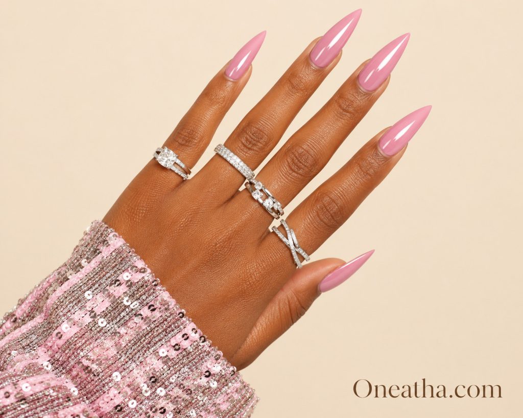 Pink glossy nails by Oneatha featuring a soft feminine pink color with a beautiful high-shine glossy finish for an elegant and timeless nail look.