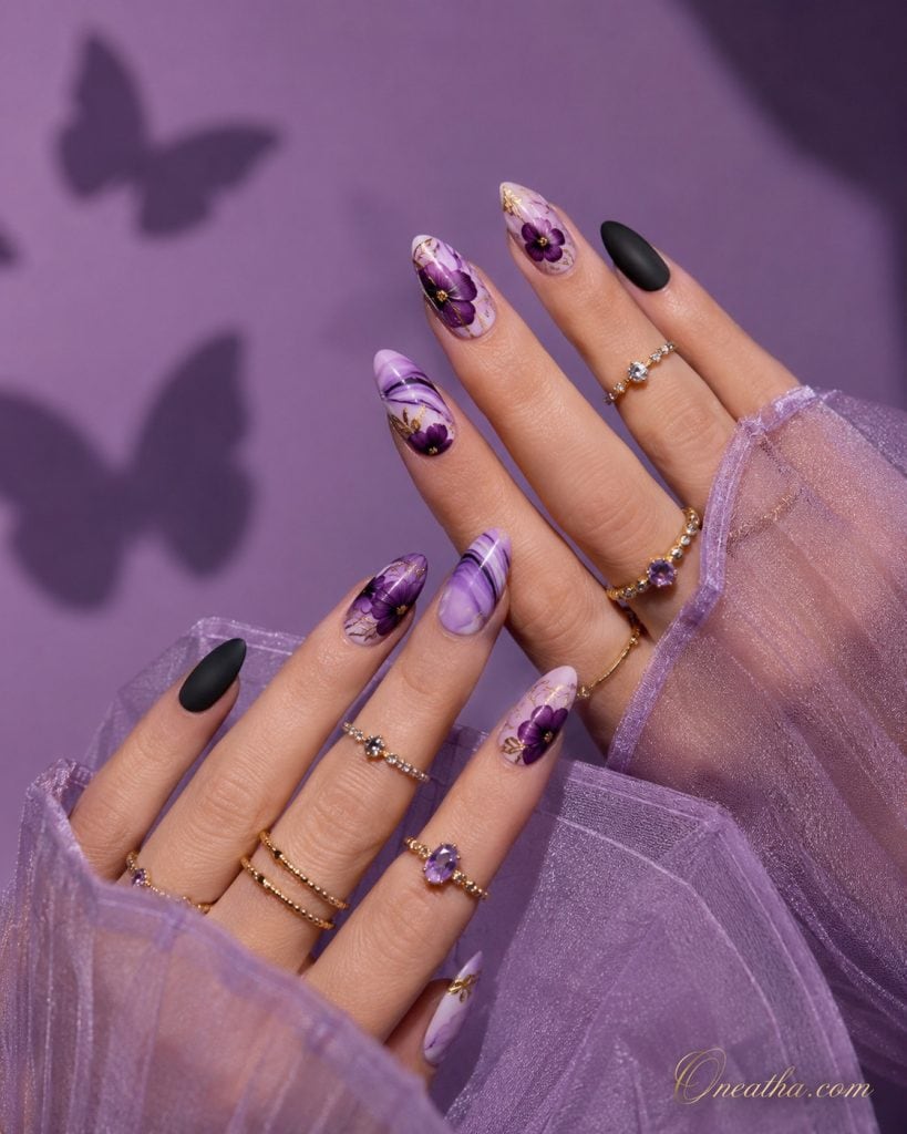 Oneatha Floral Purple Nails featuring purple marble nail art, purple striped nails, floral nail designs, spring nails, purple flower nails, elegant manicure inspiration, luxury purple nail art by Oneatha.