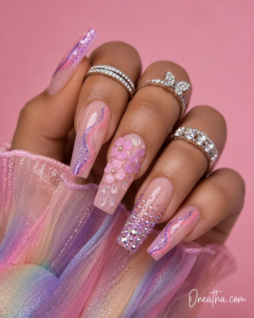 Purple and pink floral nail designs with soft romantic tones, feminine baddie nails by Oneatha.