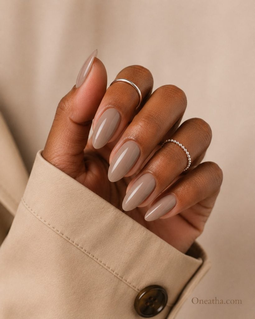 Taupe almond nails.