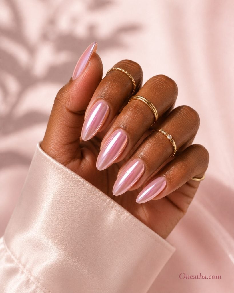 Pink chrome nails.
