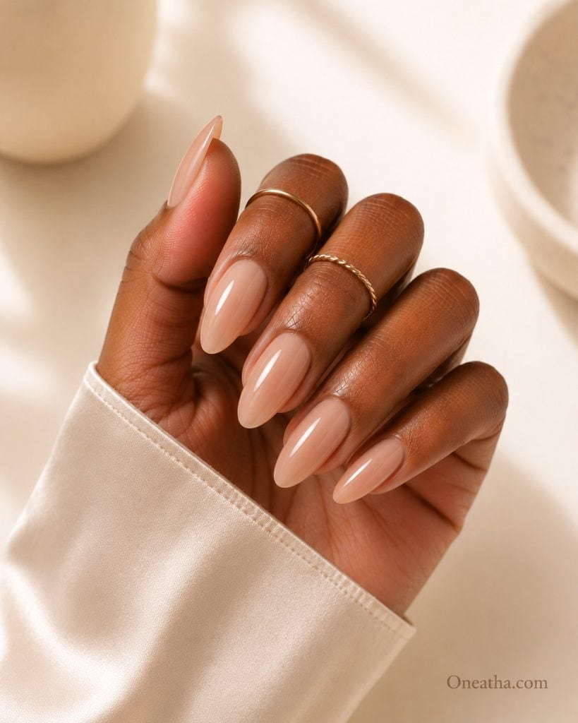 Sheer nude nails.