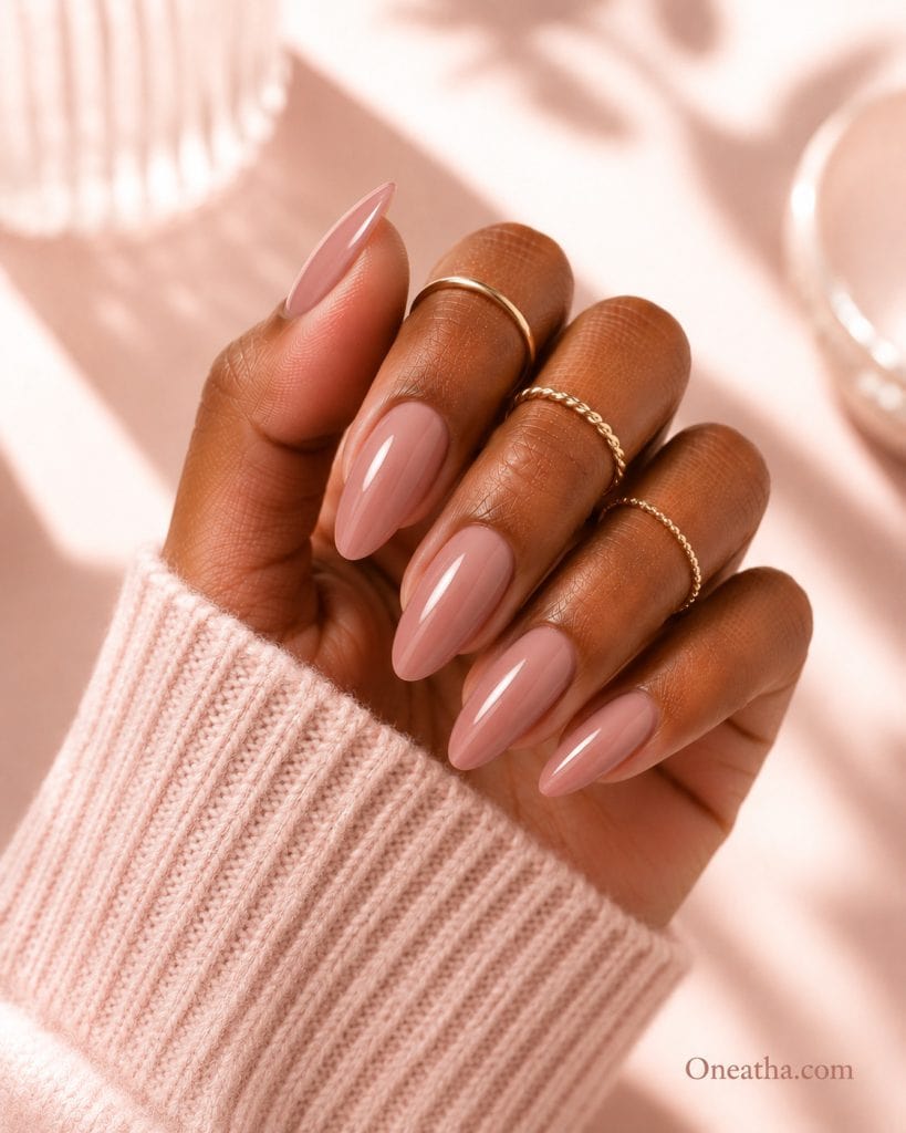 Rosy nude nails.