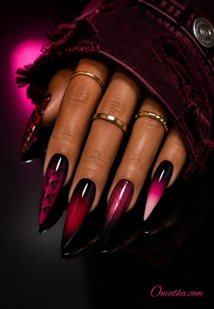 Oneatha Nails by Oneatha featuring glossy black cherry butterfly stiletto nails.