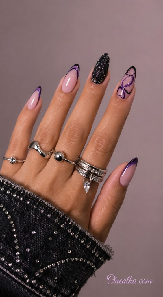 Glossy stiletto nail design by Oneatha featuring soft lilac nails with deep purple swoops, black heart line art, one black glitter accent nail