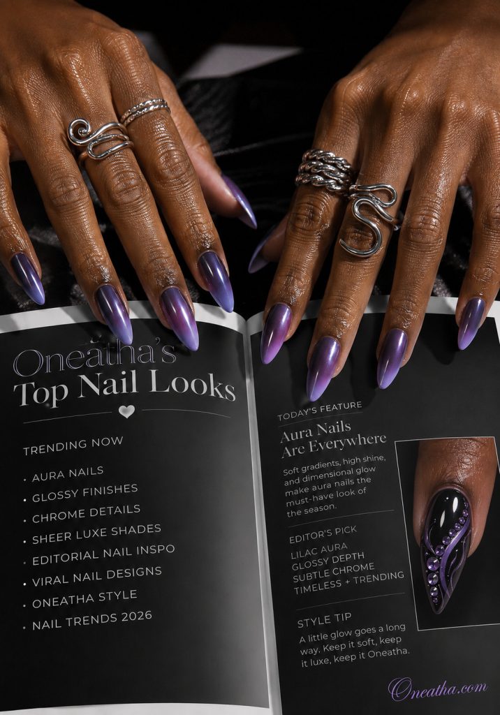 Editorial Luxe by Oneatha featuring glossy purple aura stiletto nails on a warm cinnamon-toned hand model with silver rings resting on a luxury beauty magazine.
