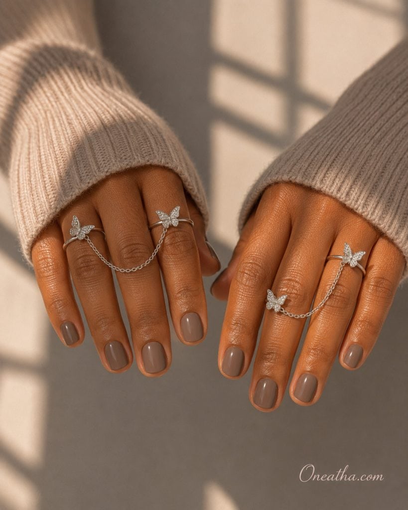 Soft taupe short nails by Oneatha.