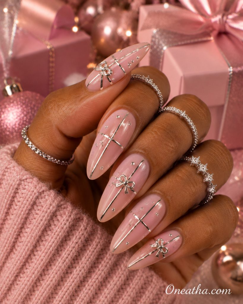 Pink gift wrap Christmas nails by Oneatha.