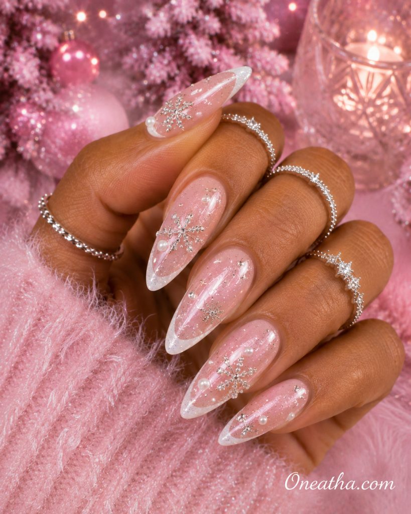 Frosted pink French Christmas nails by Oneatha.