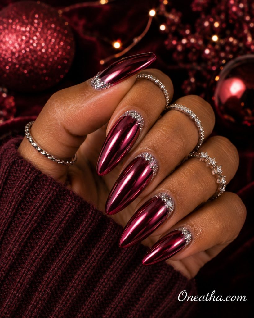 Cranberry chrome Christmas nails by Oneatha.