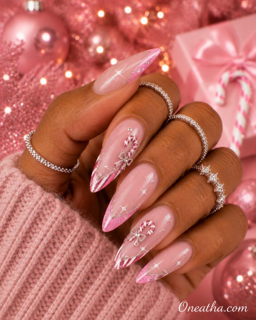 Pink candy cane French nails by Oneatha.