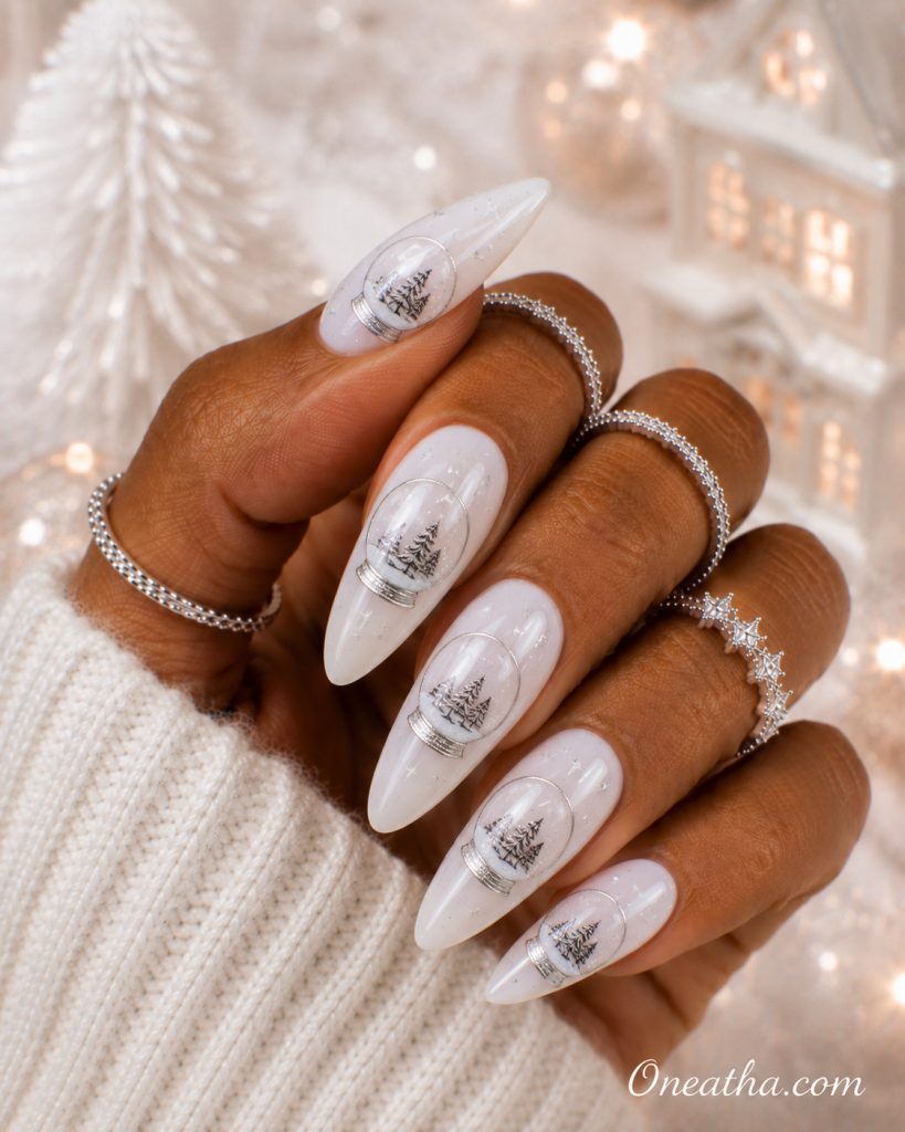 Snow globe Christmas nails by Oneatha.