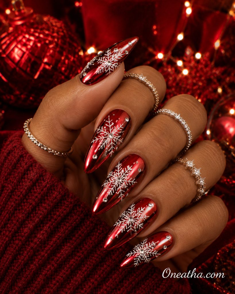 Red chrome snowflake Christmas nails by Oneatha.